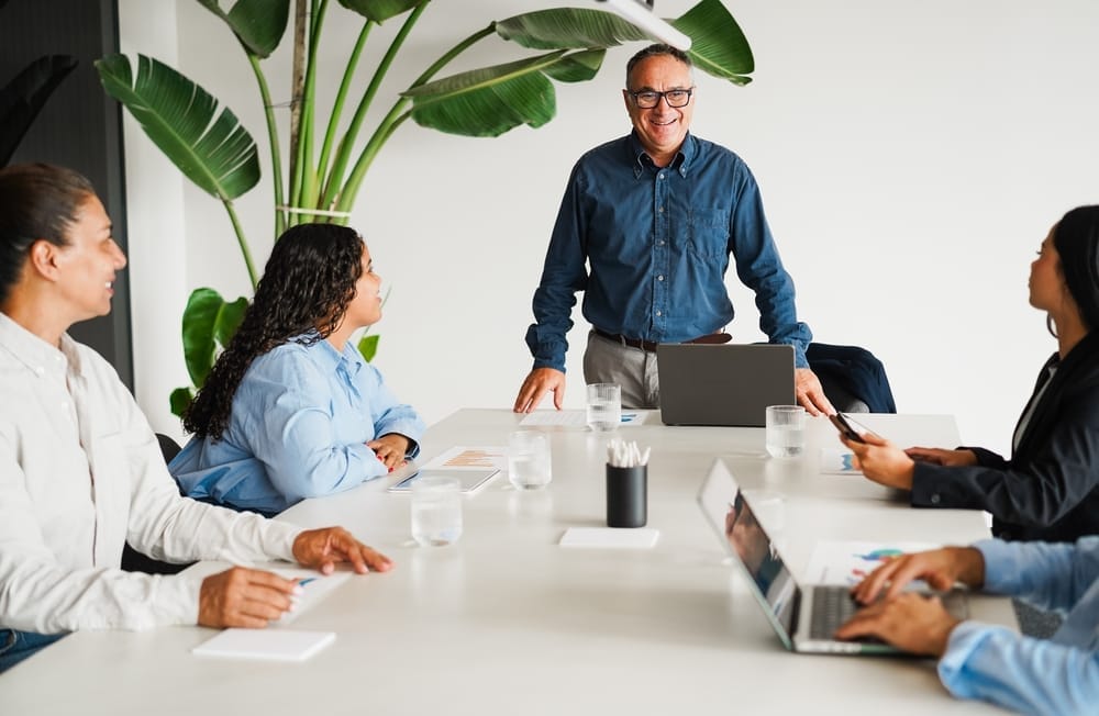 multigenerational workers around a conference table